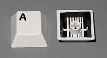220px-Two-shot_injection_molded_keycaps